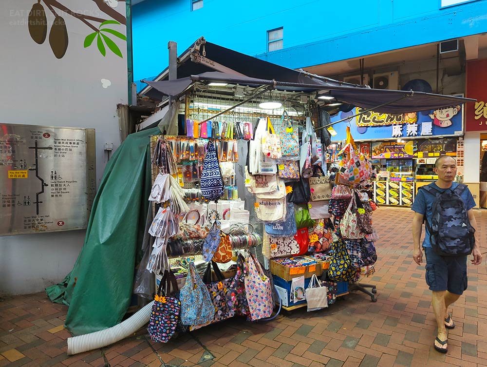 A stall with a portable air conditioner.